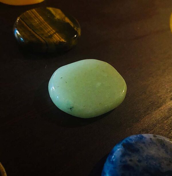 These are the seven chakra healing gem stones and crystal we used in the immersive chakra alignment therapy group class "The 49 Professions of Joy" by personal trainer Jack Kirven. This one is green aventurine.