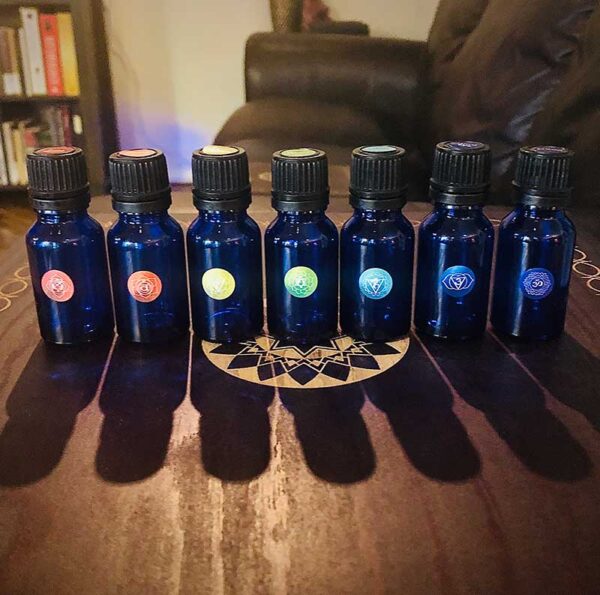 The complete set of 7 chakra essential oil blends from the chakra alignment therapy workshop, "The 49 Professions of Joy," by personal trainer Jack Kirven.