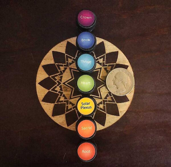 The complete sample set of 7 chakra essential oil blends from the chakra alignment therapy workshop, "The 49 Professions of Joy," by personal trainer Jack Kirven.