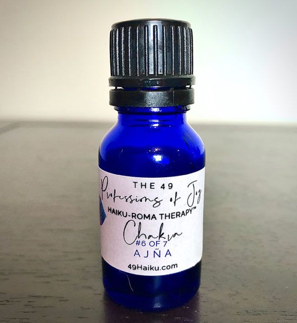 The essential oil blend for Ajña from the chakra alignment therapy workshop, "The 49 Professions of Joy," by personal trainer Jack Kirven.