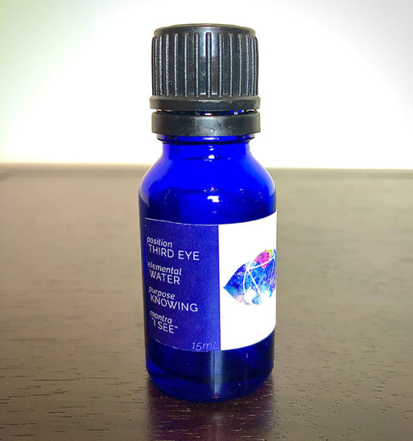 The essential oil blend for Ajña from the chakra alignment therapy workshop, "The 49 Professions of Joy," by personal trainer Jack Kirven.