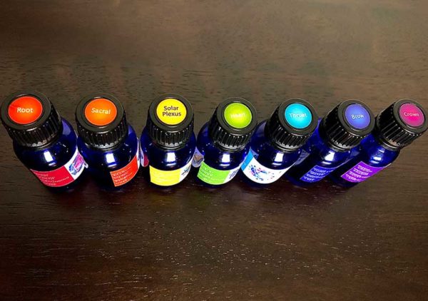 The essential oil blends for all seven chakras from the chakra alignment therapy workshop, "The 49 Professions of Joy," by personal trainer Jack Kirven.