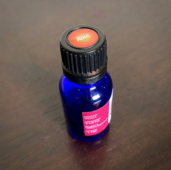 The essential oil blend for Muladhara from the chakra alignment therapy workshop, "The 49 Professions of Joy," by personal trainer Jack Kirven.